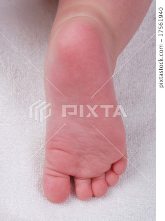 Children's foot on a soft towel Children's foot on a soft towel 17561940