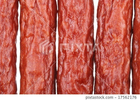 Background of tasty sausages on white 17562176