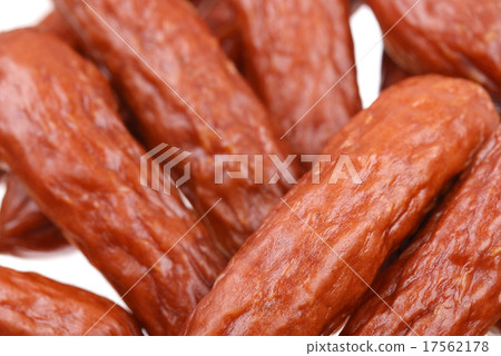 Group of tasty sausages on white 17562178