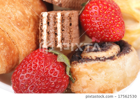 Fresh buns on a plate isolated 17562530