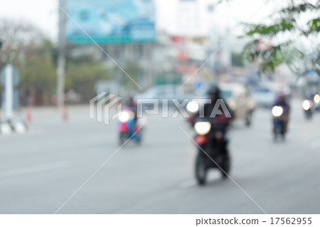 car and motorcycle driving on road with traffic car and motorcycle driving on road with traffic 17562955