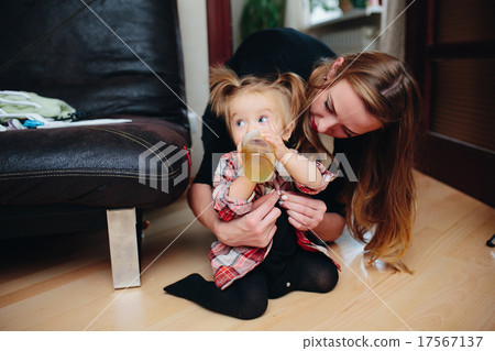 Sweet baby girl sitting on the floor Sweet baby girl sitting on the floor 17567137