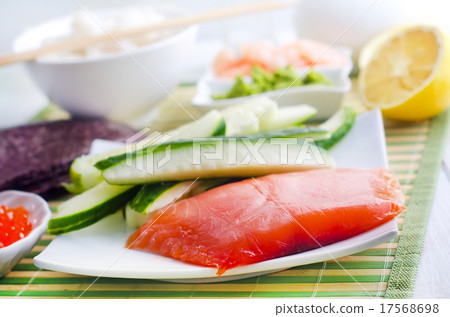 ingredients for sushi, sakmon and cucumber ingredients for sushi, sakmon and cucumber 17568698