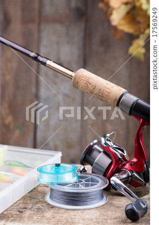 fishing tackles on old wooden board fishing tackles on old wooden board 17569249