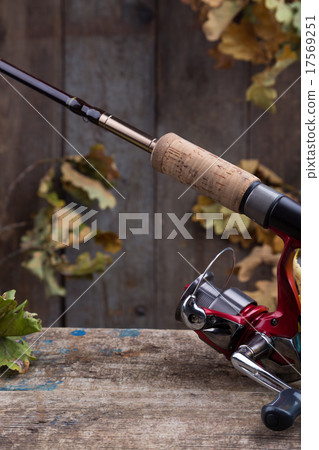 fishing tackles on old wooden board fishing tackles on old wooden board 17569251