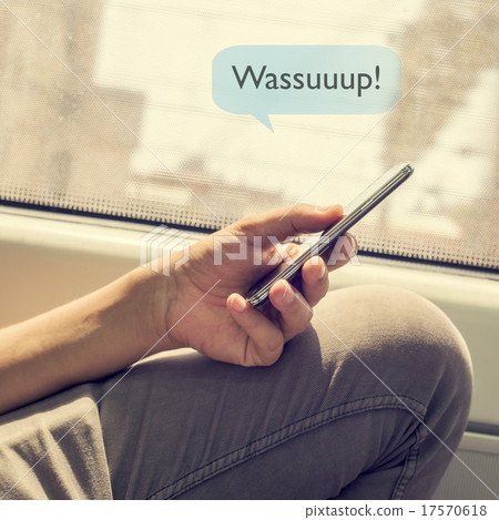 man sending a text message with the text wassuuuup man sending a text message with the text wassuuuup 17570618