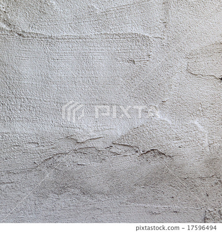 plasterer concrete worker at wall of house  17596494