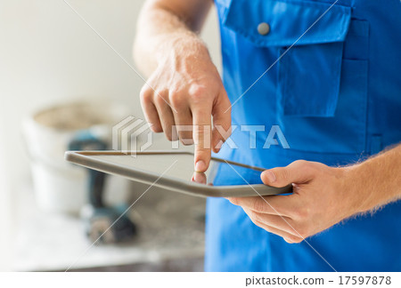 close up of builder or workman with tablet pc 17597878