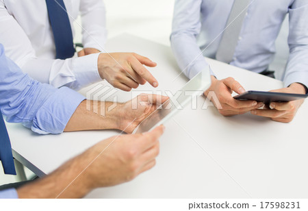 close up of businessman hands with tablet pc close up of businessman hands with tablet pc 17598231