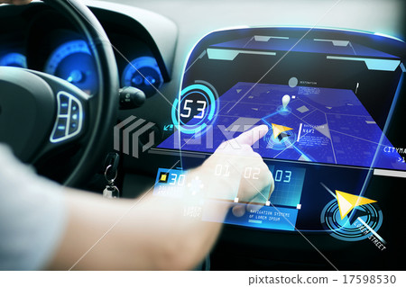 male hand using navigation system on car dashboard 17598530