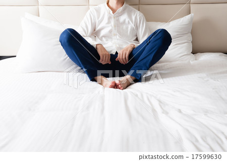 A man being shocked on the bed A man being shocked on the bed 17599630