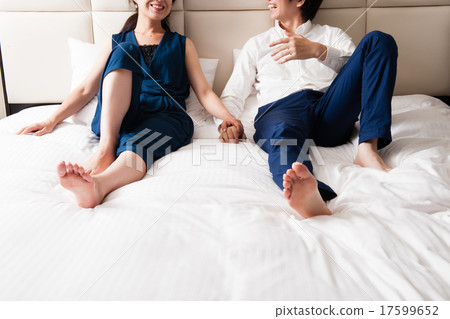 A good couple on the bed 17599652
