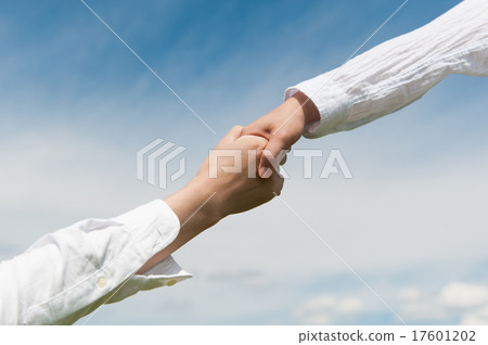 Handshake with sky as background 17601202