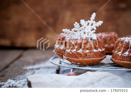 Small Baked Cake Decorated with White Snowflakes  17605932