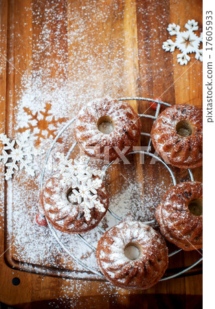 Cakes Decorated with Snowflakes and Icing Sugar 17605933