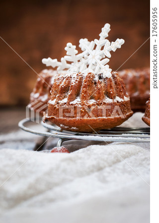 Small Baked Cake Decorated with White Snowflakes 17605956