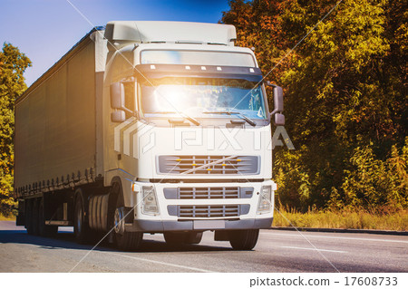 truck is driving on the country highway 17608733