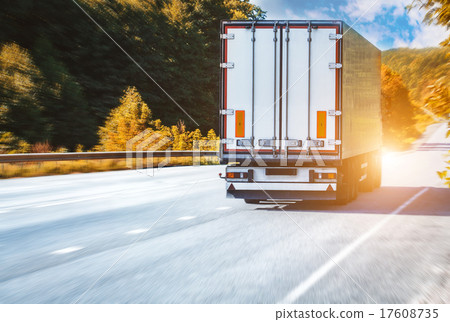 truck on the asphalt rural road on the sunset 17608735