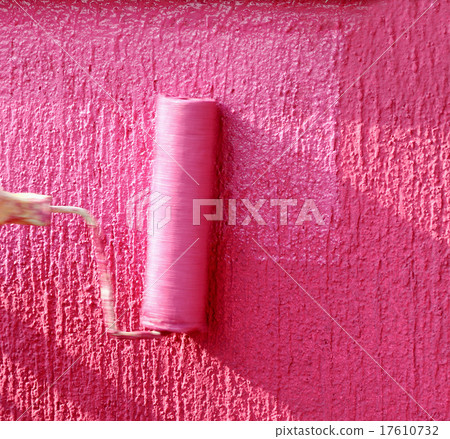 Painting, paint roller at pink wall Painting, paint roller at pink wall 17610732