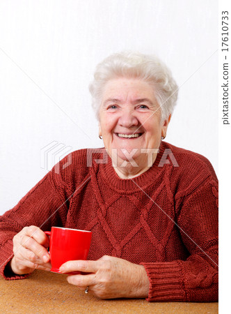 Old woman with coffee Old woman with coffee 17610733
