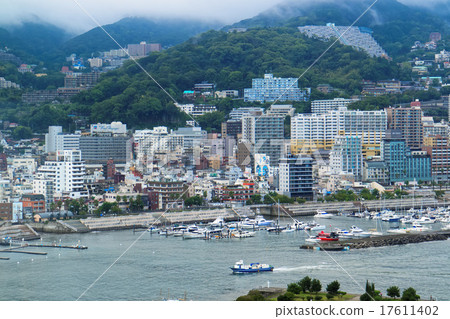 The Atami port in the typhoon and the fishing boat entering the port 17611402