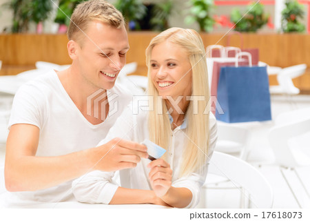 Loving couple sitting in the cafe  17618073