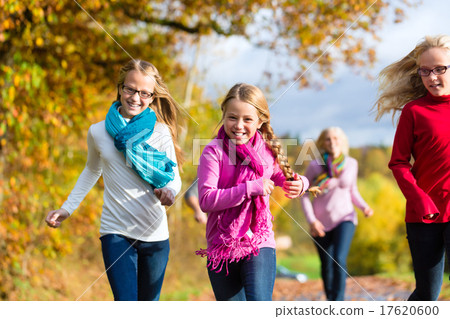 Family take a walk in autumn forest Family take a walk in autumn forest 17620600
