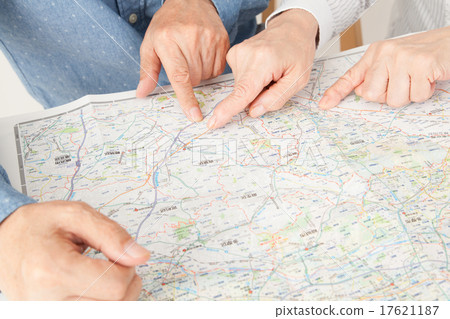 Senior couple pointing to the map Senior couple pointing to the map 17621187