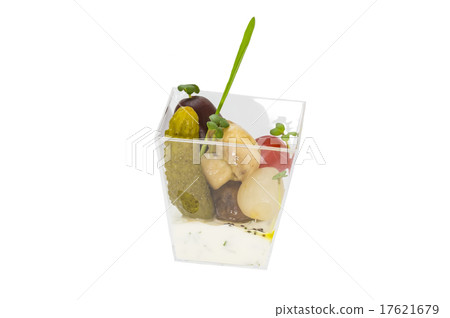 mini canape with meat and vegetables on a white ba 17621679