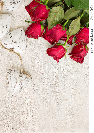 White wooden hearts and red roses White wooden hearts and red roses 17624542