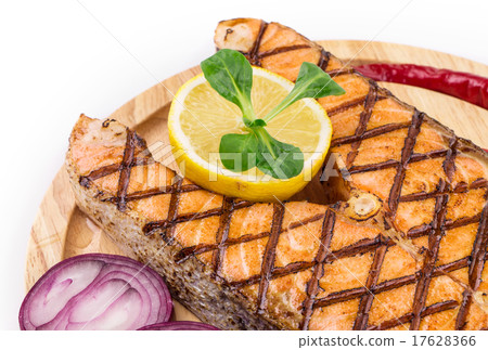 Salmon steaks on platter. 17628366