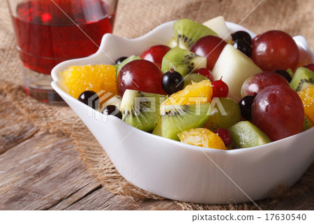 Fruit salad and grape juice close up. horizontal Fruit salad and grape juice close up. horizontal 17630540