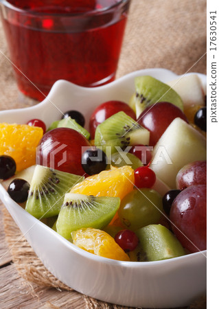 Fruit salad and grape juice close up. vertical Fruit salad and grape juice close up. vertical 17630541