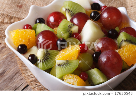 salad of oranges, kiwi, grapes and berries macro salad of oranges, kiwi, grapes and berries macro 17630543