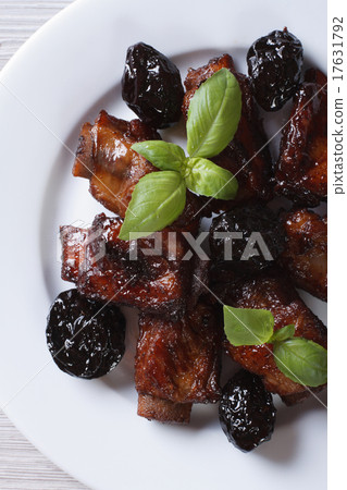 Pork ribs stewed with prunes closeup top view 17631792