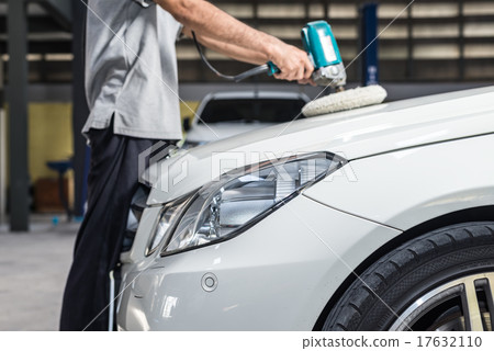 Car polishing series : Worker waxing white car Car polishing series : Worker waxing white car 17632110