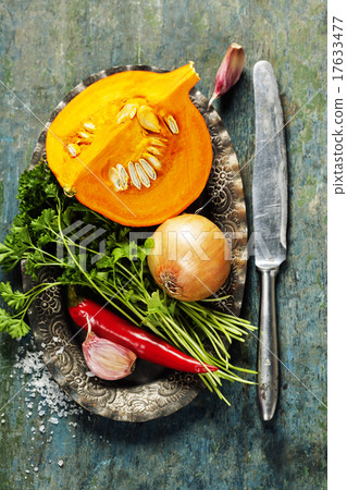 Pumpkin soup ingredients on wooden background Pumpkin soup ingredients on wooden background 17633477