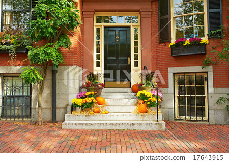 Pumpkins near the door for Halloween 17643915