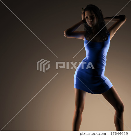 Sexy brunette woman posing in dark studio Sexy brunette woman posing in dark studio 17644629