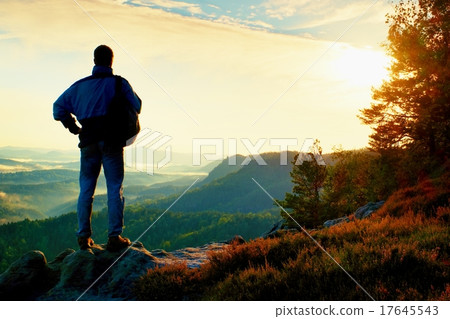 Silhouette of man with backpack. Spring daybreak 17645543