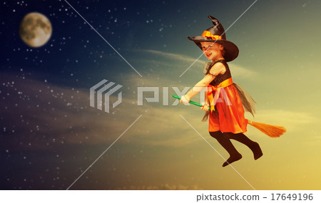 Halloween. Witch child flying on broomstick at sunset night sky. Halloween. Witch child flying on broomstick at sunset night sky. 17649196