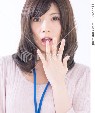 Awesome business woman putting his hand on her mouth 17654311