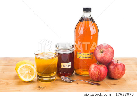 Apple cider vinegar with honey and lemon Apple cider vinegar with honey and lemon 17658076