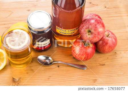 Apple cider vinegar with honey and lemon Apple cider vinegar with honey and lemon 17658077