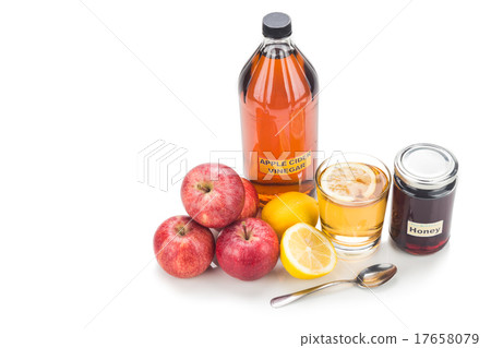 Apple cider vinegar with honey and lemon Apple cider vinegar with honey and lemon 17658079