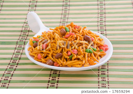 murukku or traditional indian snack on background. murukku or traditional indian snack on background. 17659294