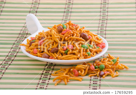 murukku or traditional indian snack on background. murukku or traditional indian snack on background. 17659295
