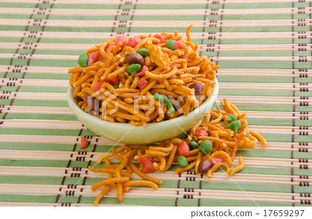 murukku or traditional indian snack on background. murukku or traditional indian snack on background. 17659297