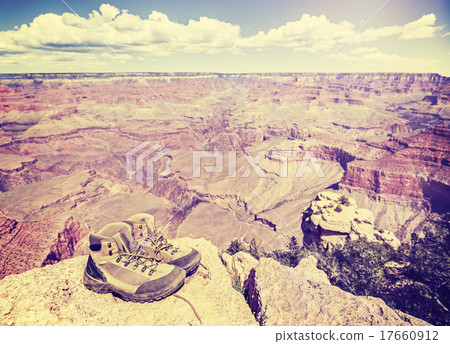 Vintage toned old trekking shoes in Grand Canyon. 17660912