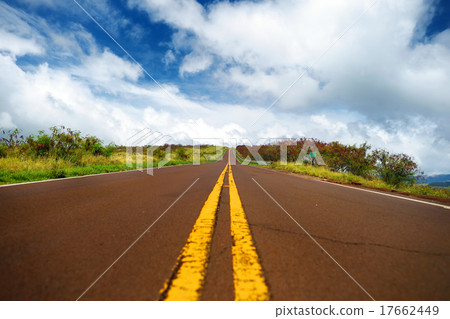 Serpentine road winding through the mountains 17662449